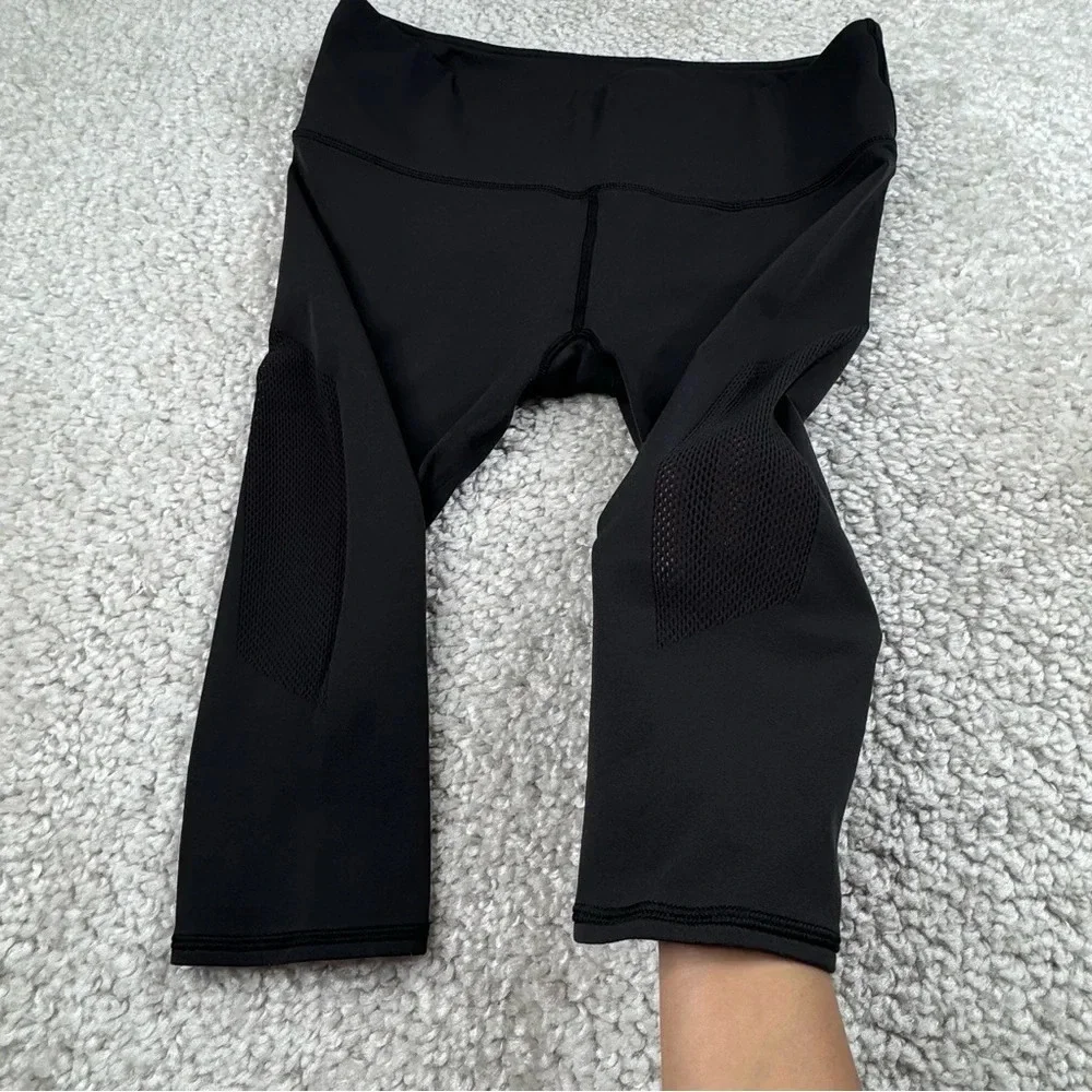 Lululemon Reveal Crop in Black. Mesh Sides. Size 12 or XL